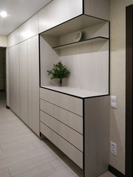 Cabinets in a narrow hallway in the corridor photo