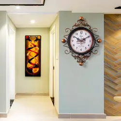 Wall clock in the living room in a modern style photo