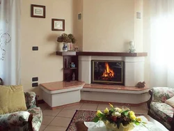 Corner fireplace in the apartment interior
