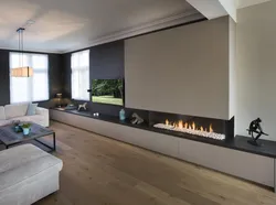 Bio-Fireplace In The Interior Of The Living Room With TV
