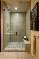 Shower cabin and bathroom made of tiles photo