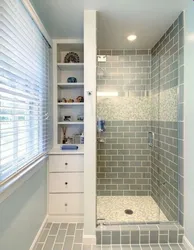 Shower cabin and bathroom made of tiles photo