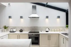 Photo of a kitchen without upper cabinets with an apron