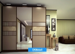 Built-in wardrobe in the hallway in light colors photo