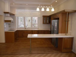 U-shaped kitchen design with breakfast bar