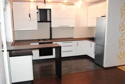 U-shaped kitchen design with breakfast bar