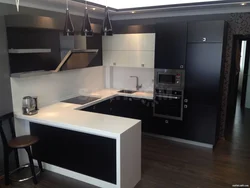 U-shaped kitchen design with breakfast bar
