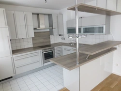 U-shaped kitchen design with breakfast bar