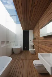 Wooden bathroom interior photo