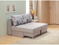 Sleeping sofa in the apartment photo