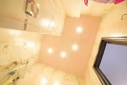 Photo of a stretch ceiling in a small bathroom