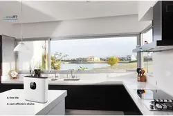 Kitchen interior with a large window in the house