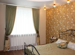 One curtain in the bedroom interior photo