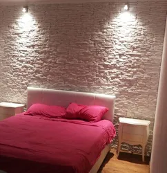 Bedroom with decorative plaster on the walls in the interior