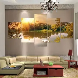 Paintings in the living room interior above the sofa in a modern style