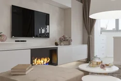 Photo Of A Fireplace In An Apartment With A TV In A Modern Style