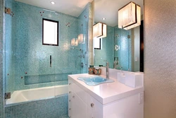 Small bathtub with mosaic design photo