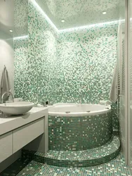 Small Bathtub With Mosaic Design Photo