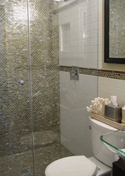 Small bathtub with mosaic design photo