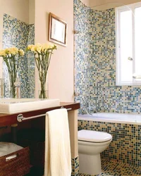 Small bathtub with mosaic design photo