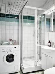 Photo of small bathrooms with shower and washing machine