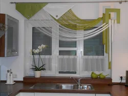 Curtains In The Kitchen On A Large Window Photo