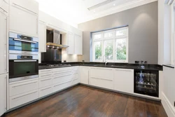 Interior White Kitchen Dark Floor