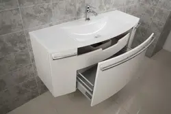 Washbasin In The Bathroom With Cabinet Photo