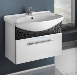 Washbasin in the bathroom with cabinet photo
