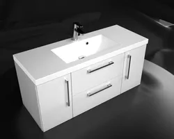 Washbasin in the bathroom with cabinet photo