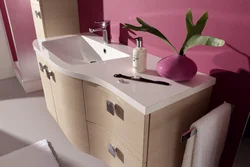 Washbasin in the bathroom with cabinet photo