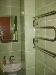 How to hide pipes in a bathtub photo