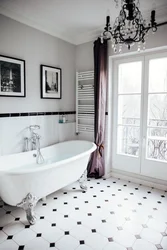Bath Design With Dark Tiles On The Floor