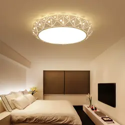 Suspended ceiling with light bulbs without a chandelier in the bedroom photo