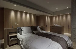 Suspended ceiling with light bulbs without a chandelier in the bedroom photo