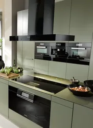Black appliances in the kitchen interior photo