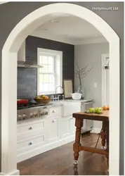 Arch in the door of a small kitchen photo