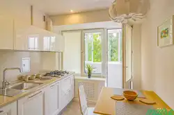 Apartment design kitchen with balcony door