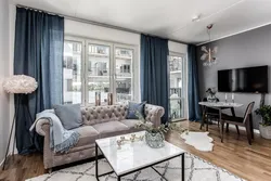 Living room design with sofa by the window