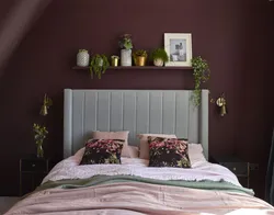 Photo of a bedroom in burgundy tones photo