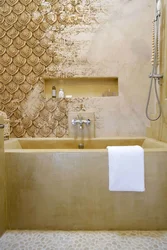 Photo of finishing a bathroom with decorative plaster