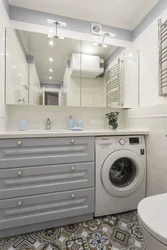 Bathroom Countertop With Washing Machine Photo