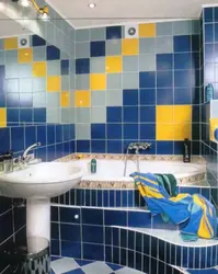 Bathtub with different tiles photo