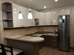 Kitchen with bar counter projects with photos in the house