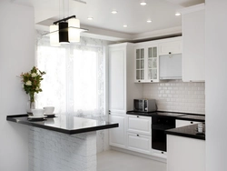 Kitchen with bar counter projects with photos in the house