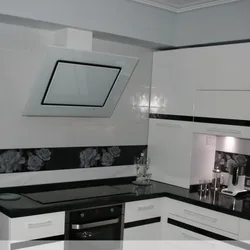Kitchen design with an inclined hood in the interior