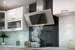 Kitchen design with an inclined hood in the interior