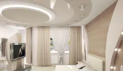Two-level suspended ceilings with lighting in the bedroom photo design