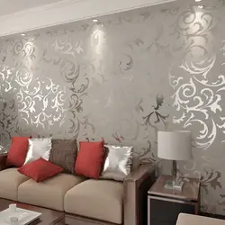 Living room design in an apartment combined light wallpaper