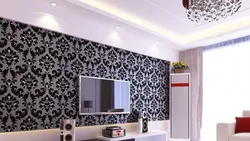 Living room design in an apartment combined light wallpaper